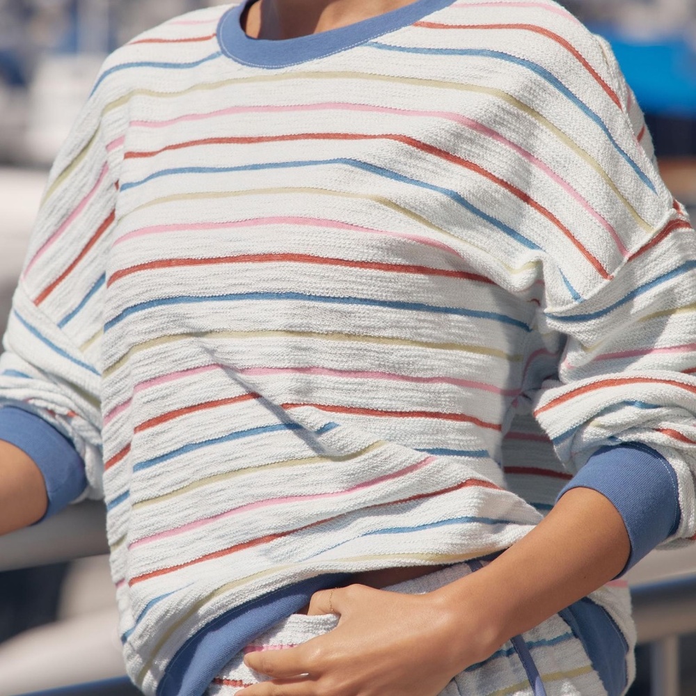 EUC gray sweatshirt with pink, red, yellow, blue stripes